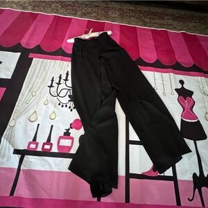 Evening wear palazzo pants, black, silky, and flowy.